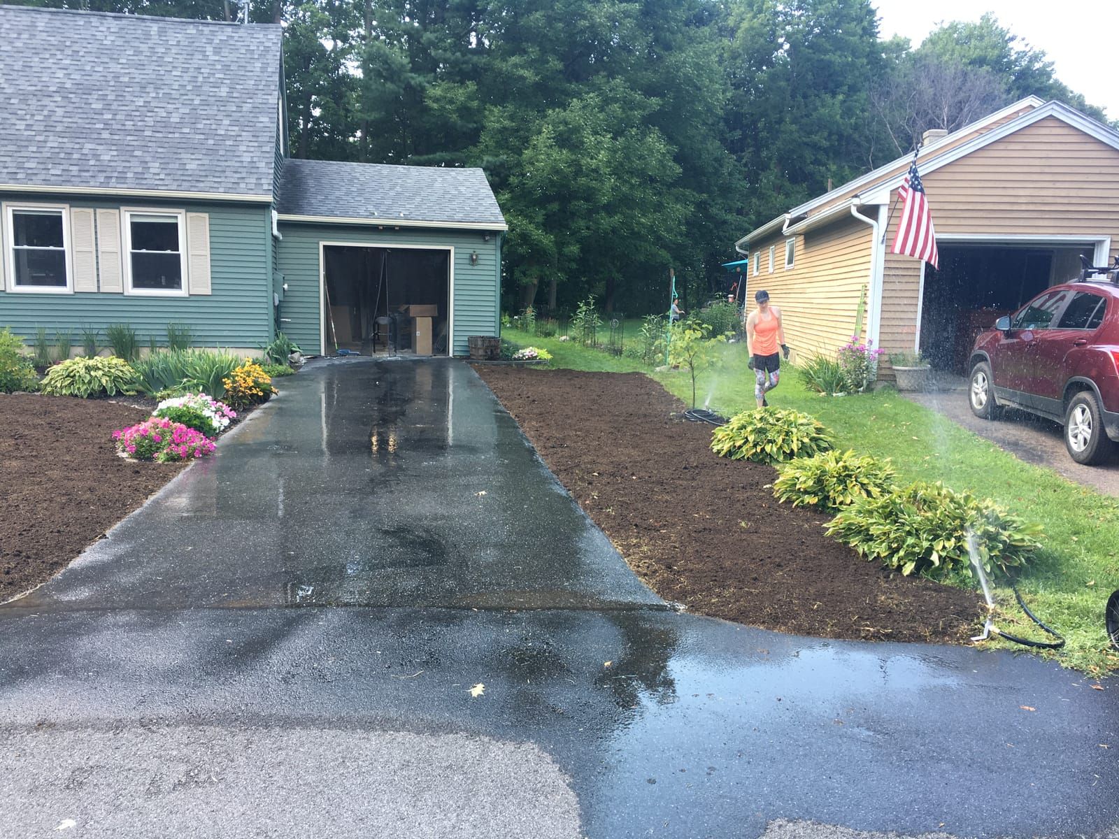 New planting beds along both sides of a driveway
