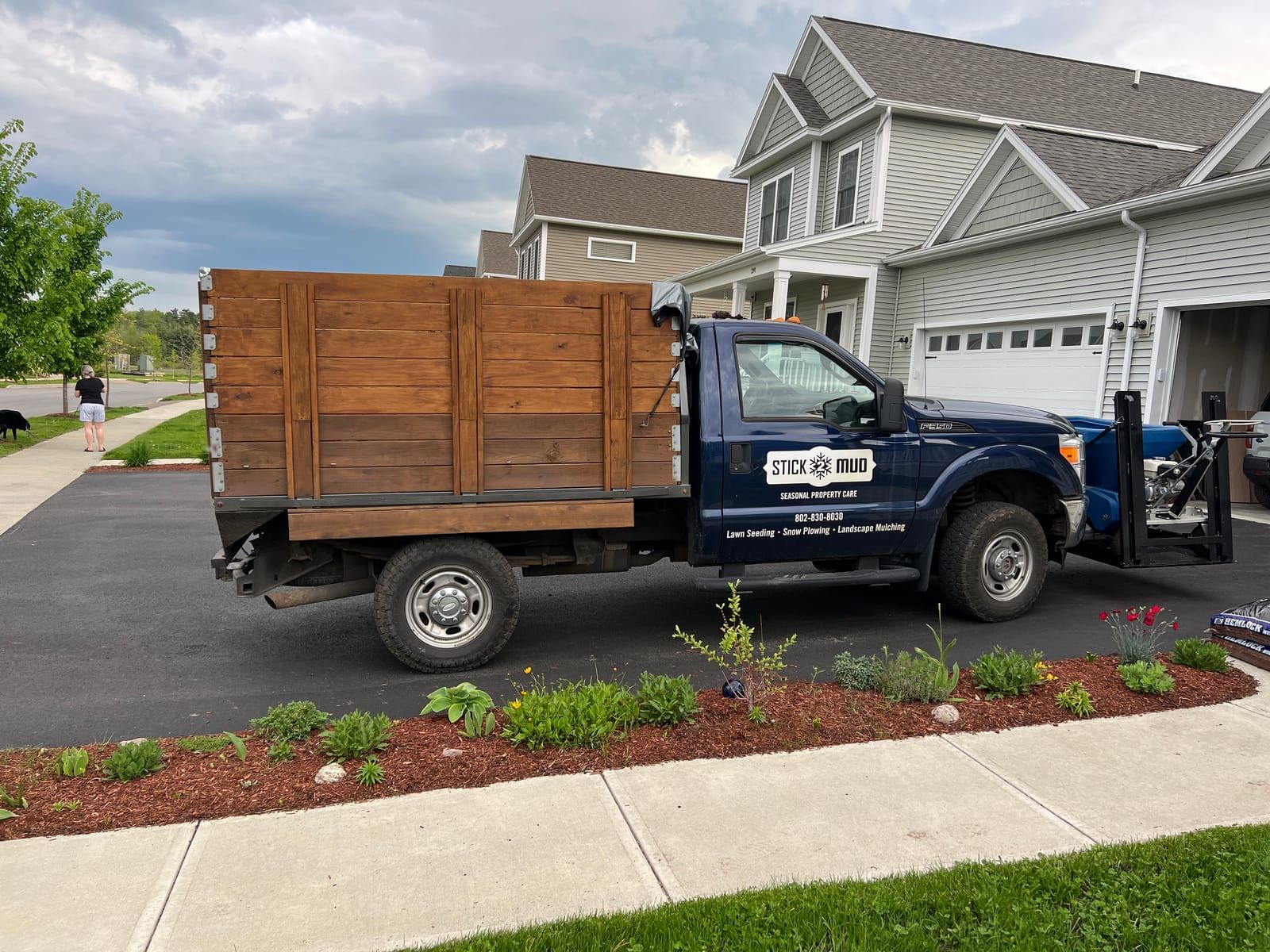 The Stick2Mud truck parked beside new plantings
